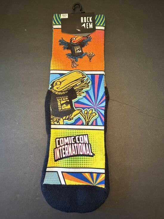 Rock ‘Em Other - NWT San Diego Comic Con SDCC Official Rock ‘EM Socks~Comic Strip Yth L 2-5.5